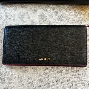 Lodis black snap wallet with red accent trim